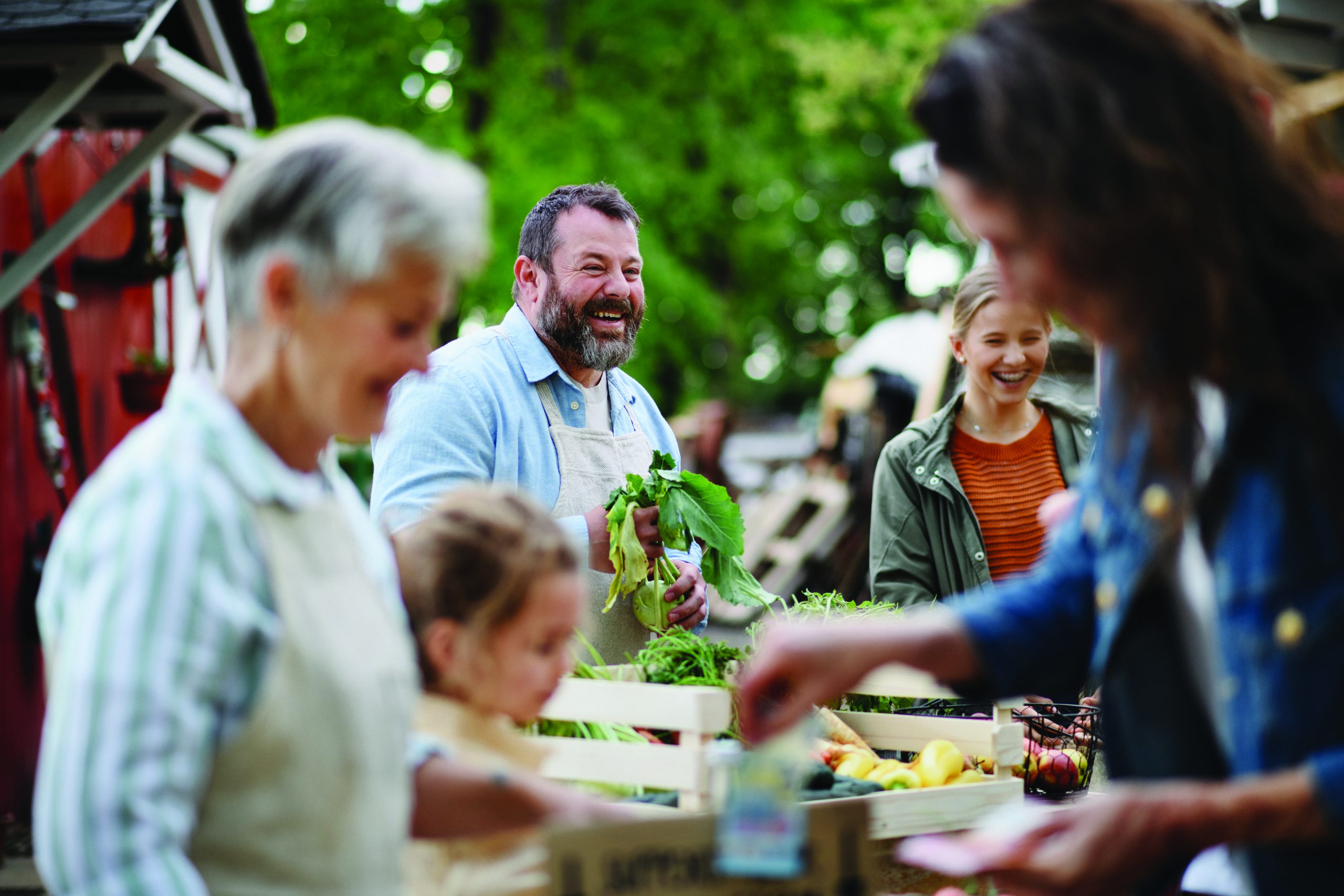 people--selling-and-buying-produce-at-farmers-market